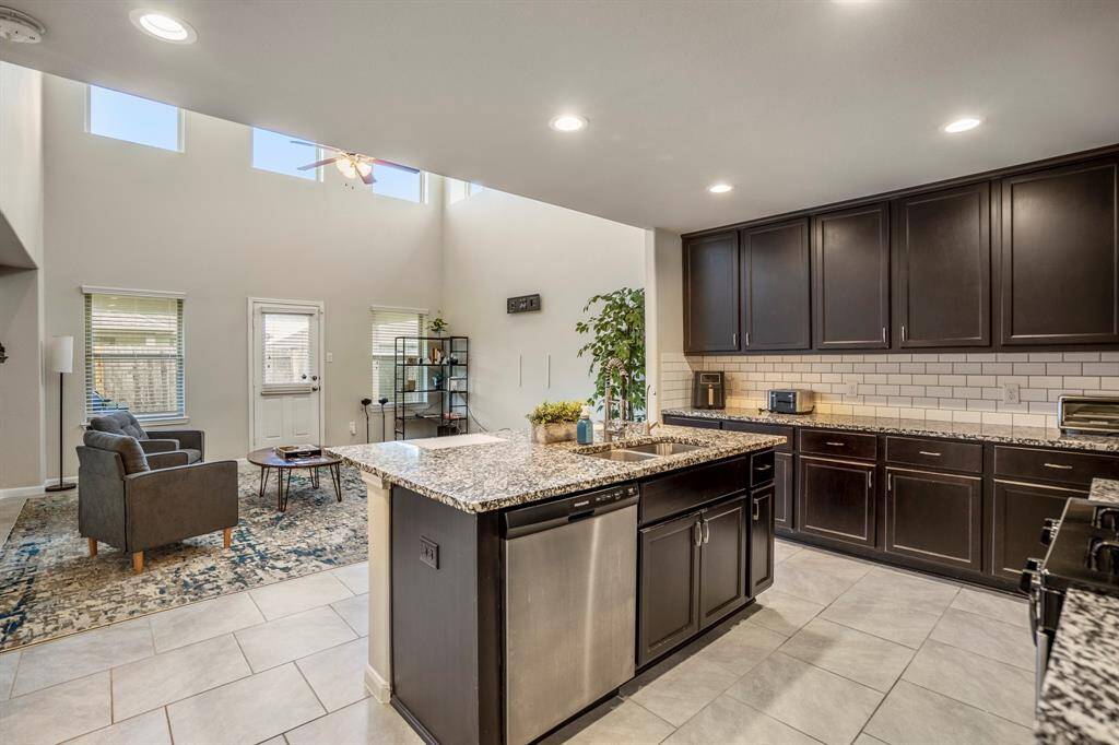 The open floorplan of the home looks out onto the family room.