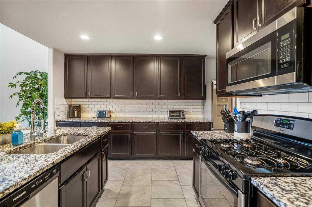 The subway tile on the backsplash makes it an easy option to keep clean and fresh.