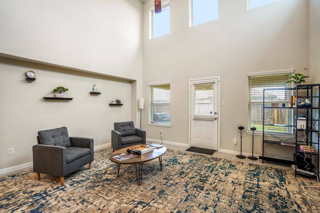 There is a door leading out onto the patio.