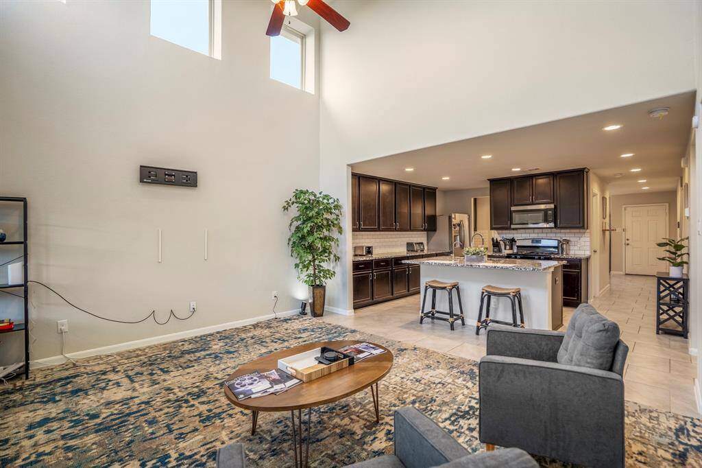 The living room is large and offers a great family relaxing area.