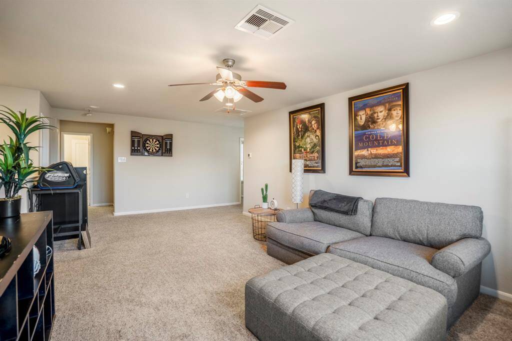 The large upstairs gameroom, which is the perfect relaxing spot.