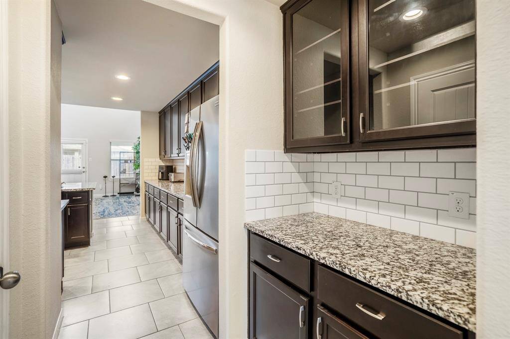 A wonderful feature is the beverage station with granite countertops and lots of additional storage.