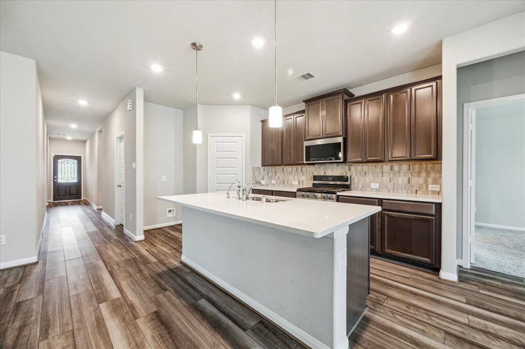 Kitchen with pendant lighting over the island