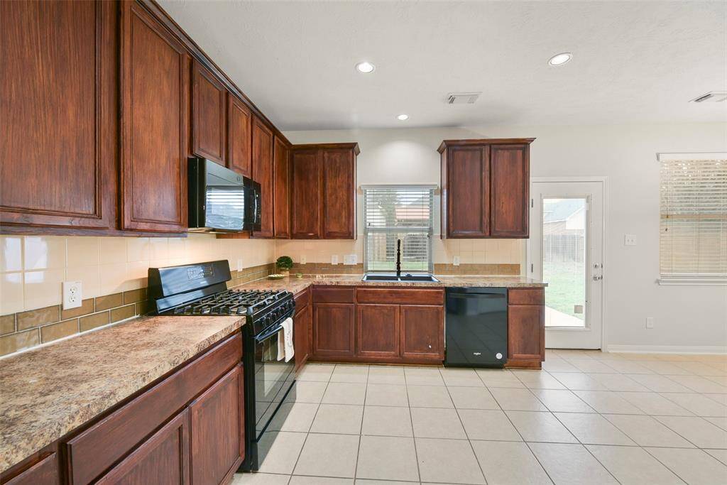 Another view of the kitchen