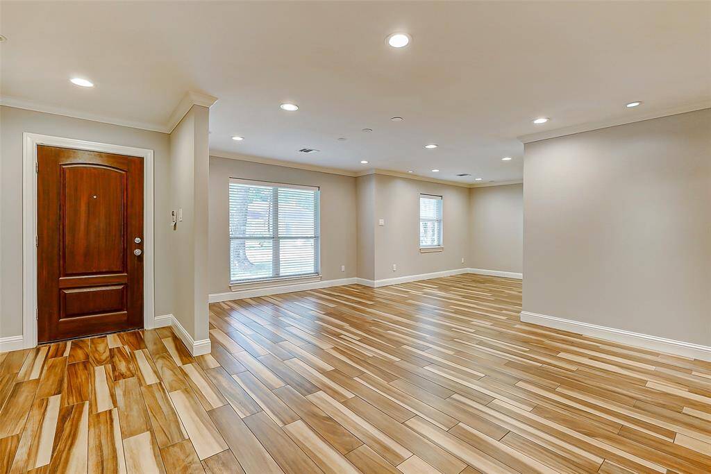 From the moment you step inside, you’re welcomed by a host of thoughtful updates—decorator paint, crown molding, recessed lighting, and more. Abundant natural light fills the space, creating a warm and inviting atmosphere.