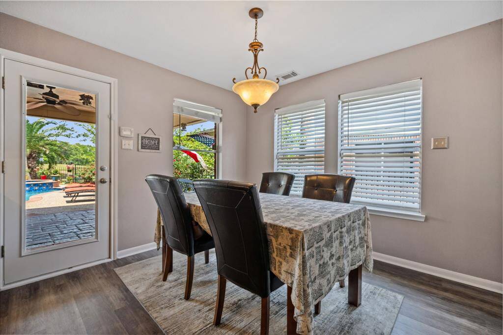 Start your day in the breakfast room with views of the pool