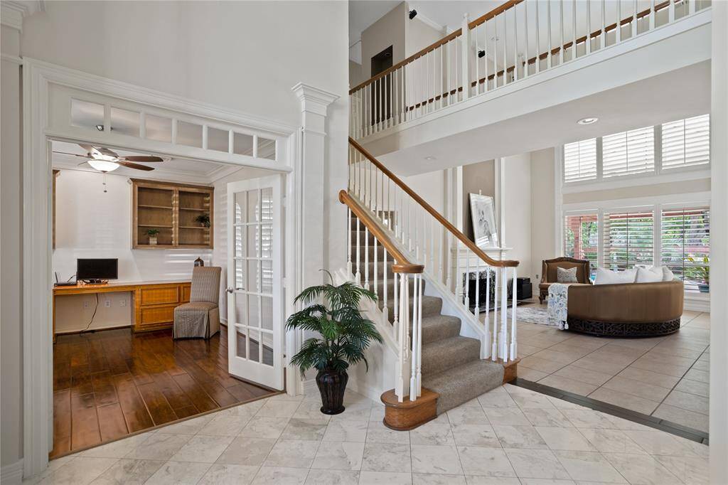 View of home office & stairs from dining room