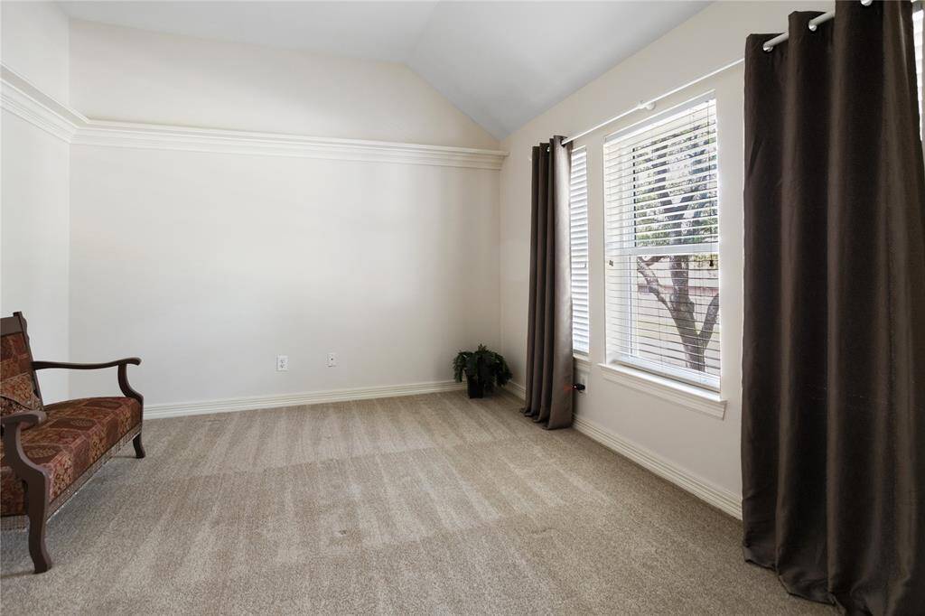 Upstairs bedroom with lots of natural lighting