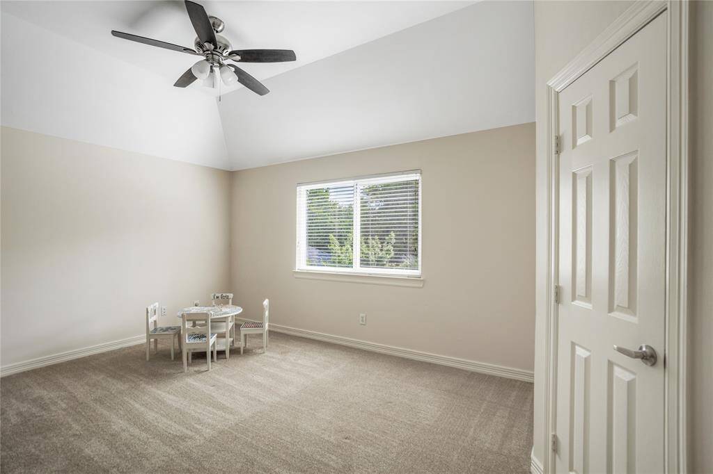 Upstairs bedroom with lots of natural lighting