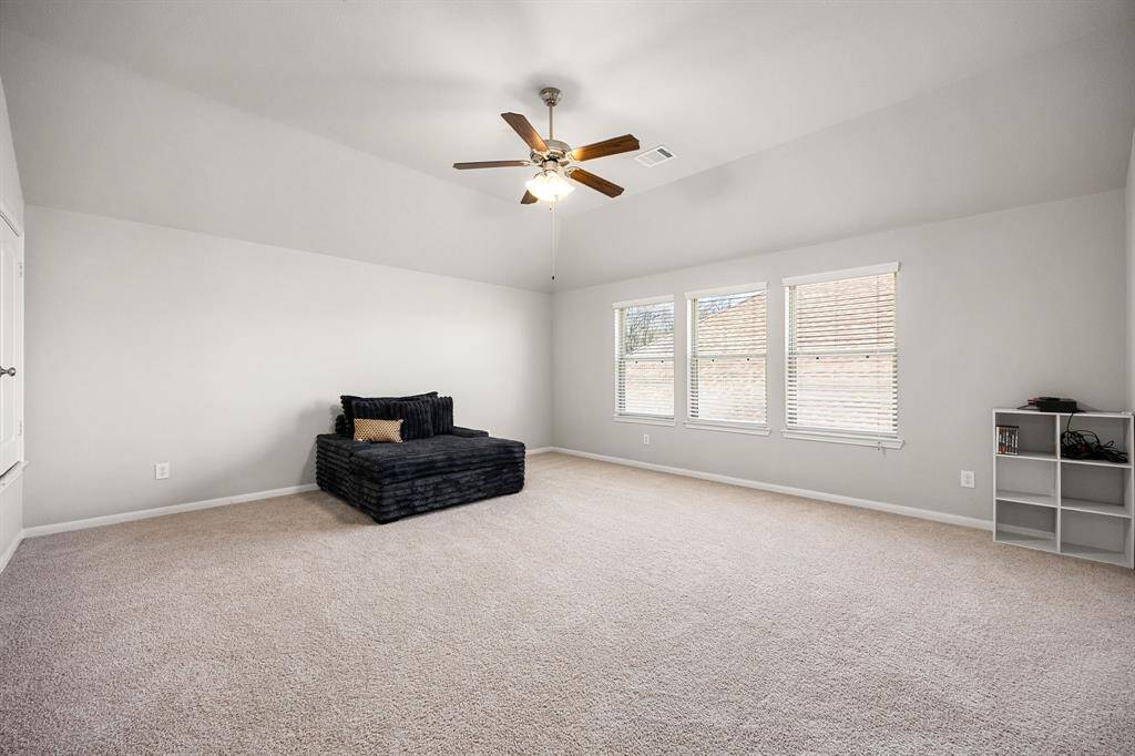 Versatile upstairs gameroom—perfect for a second office, media room, or flex space.
