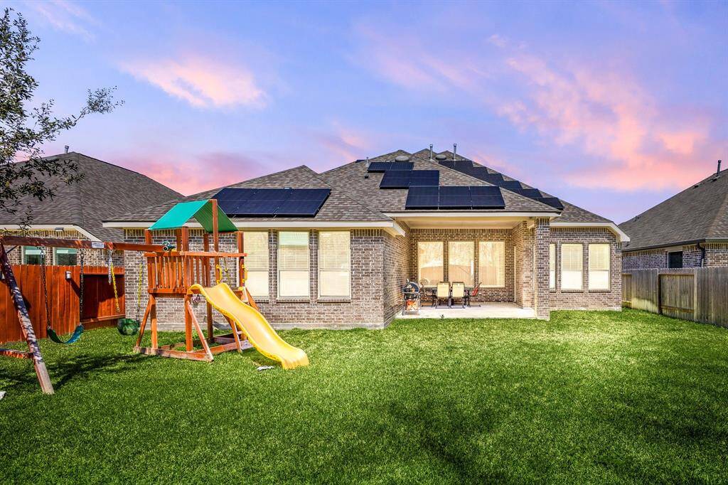 Expansive outdoor space perfect for hosting gatherings or enjoying family time.