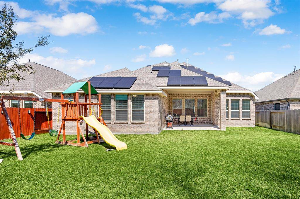 This home features an in-home generator, solar panels, and a soft water system for ultimate convenience and sustainability.