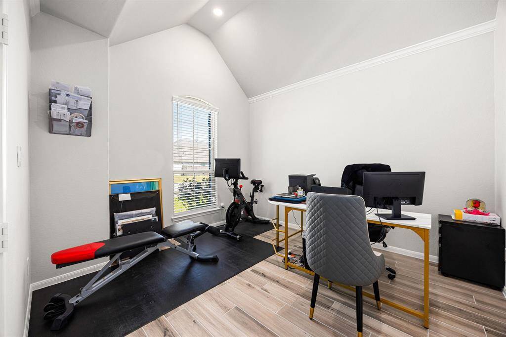 Experience the perfect work-from-home setup in this spacious and inviting office.