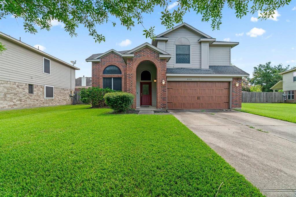 Two story home with attached 2 car garage located in a cul de sac