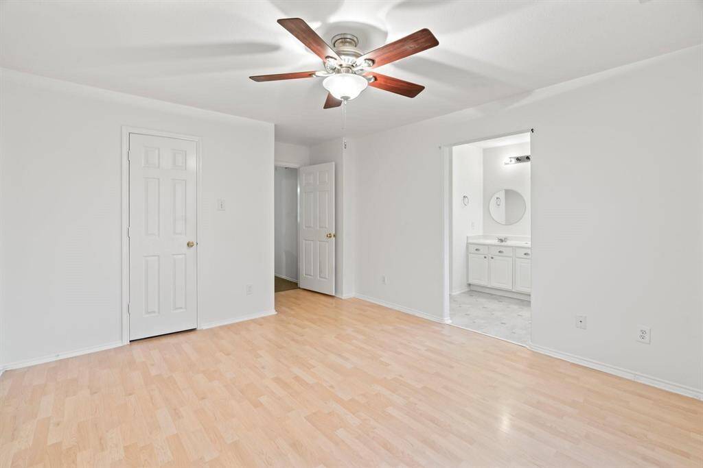 Primary bedroom has plenty of room for large furniture.