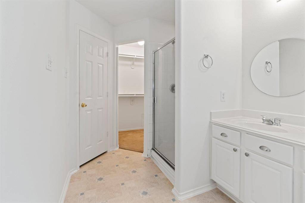 View of walk in shower