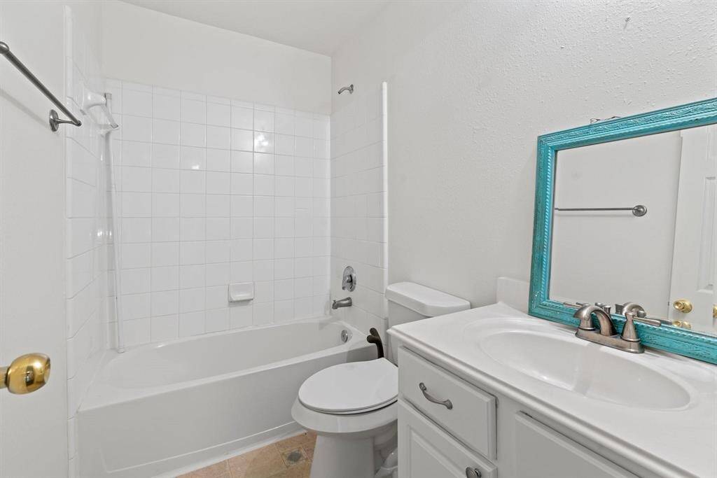 Secondary bath has tub and shower