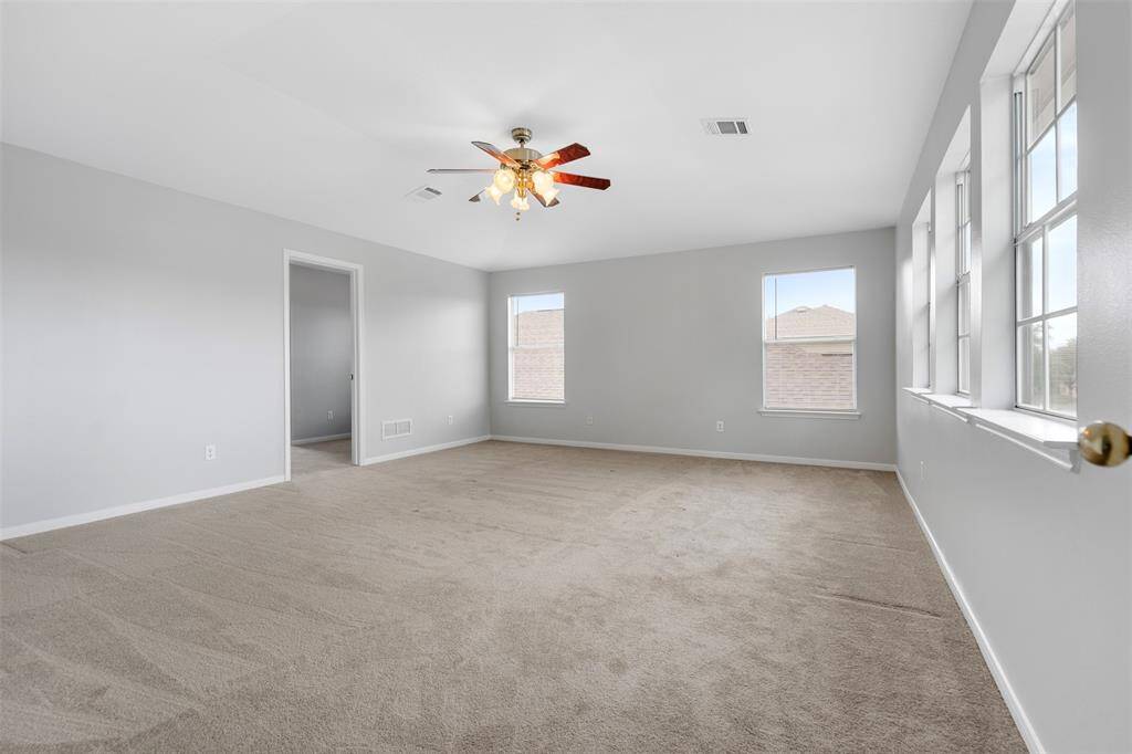 Primary bedroom with tons of natural light