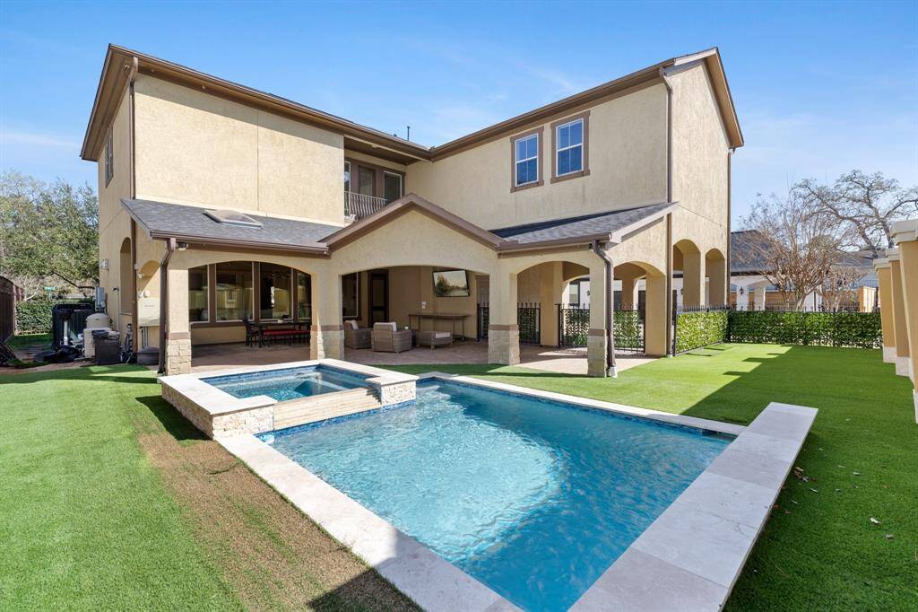 One of the highlights of this fabulous home is this recently renovated backyard with a new pool and turfed green space (all in 2020). The large covered patio and extended deck (2017) with outdoor kitchen is the perfect place to relax in the shade and watch a game and grill out!