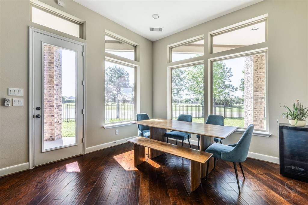 This would be the perfect place to enjoy your morning coffee- watching the world come to life right outside the windows.
