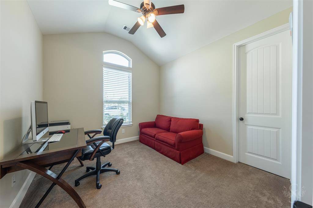 Secondary bedroom being used as home office..