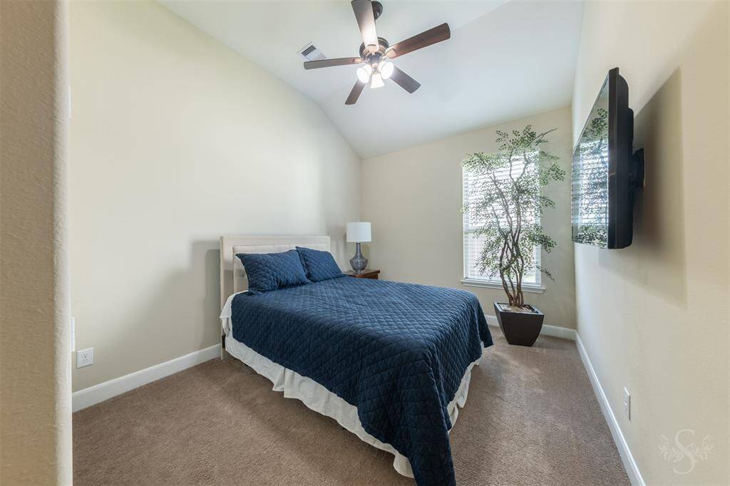 The third secondary bedroom near front of home offers quiet and privacy.