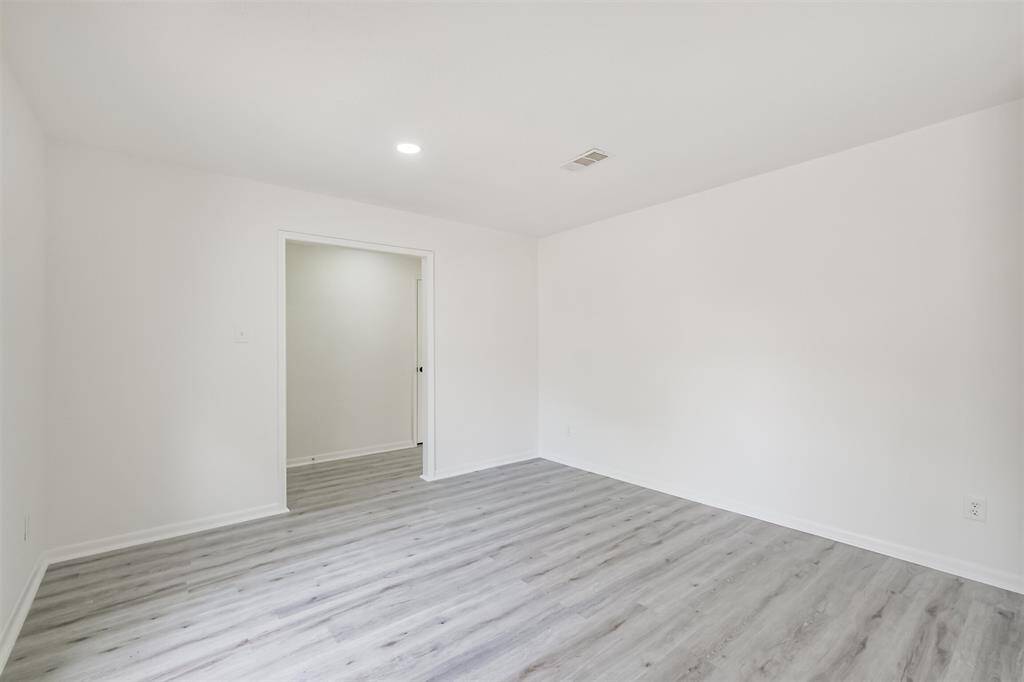Family room with canister lighting.
