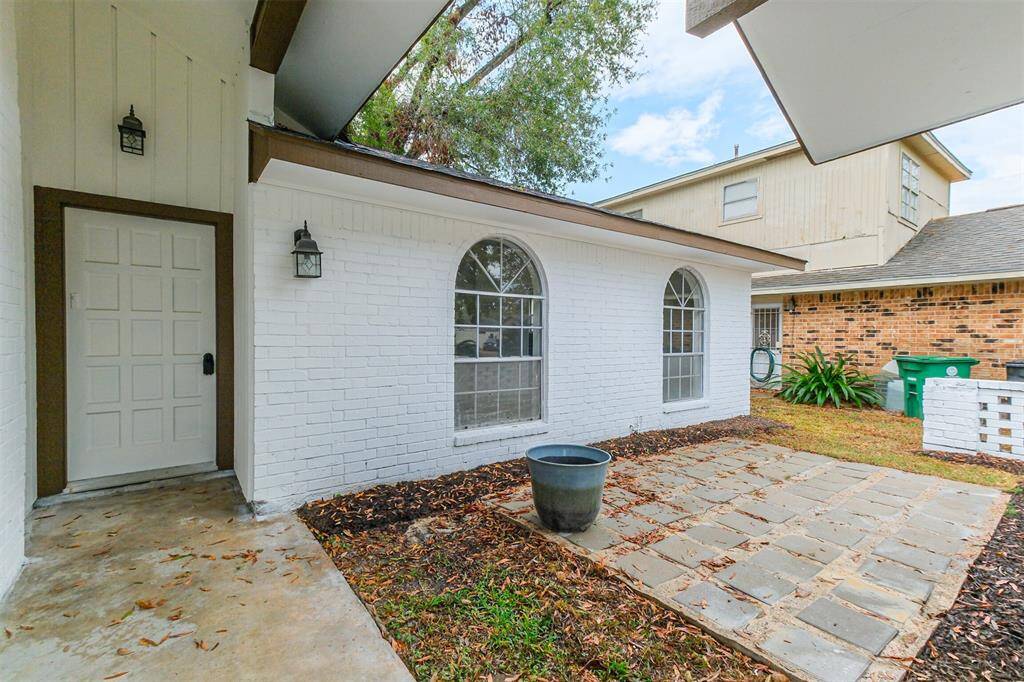A front patio designed for relaxed entertaining.