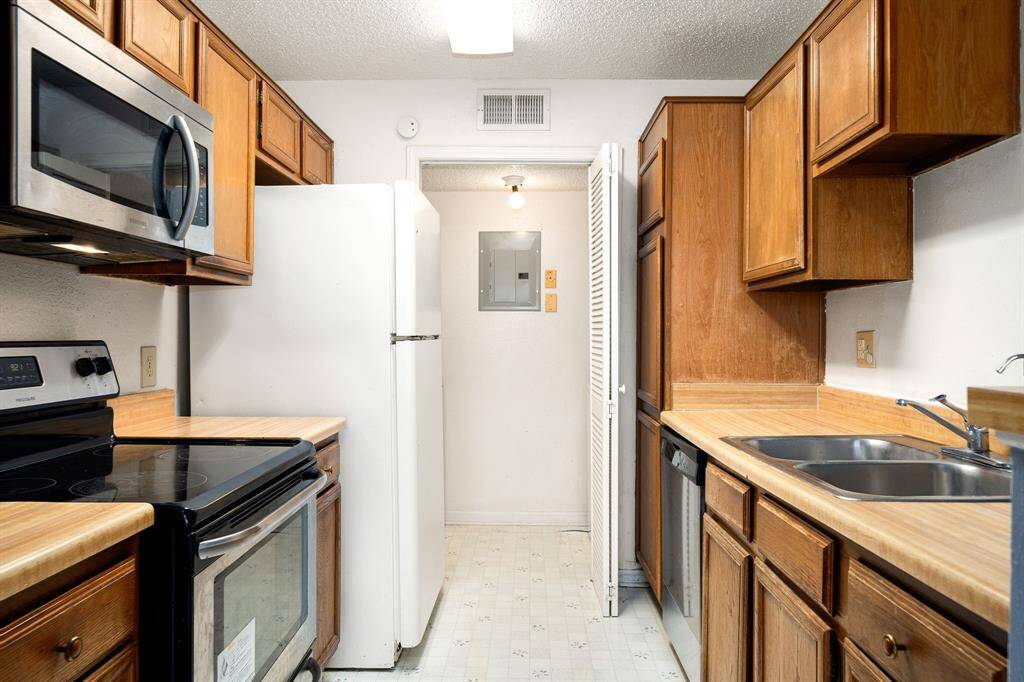 Including a refrigerator, stove, and microwave.