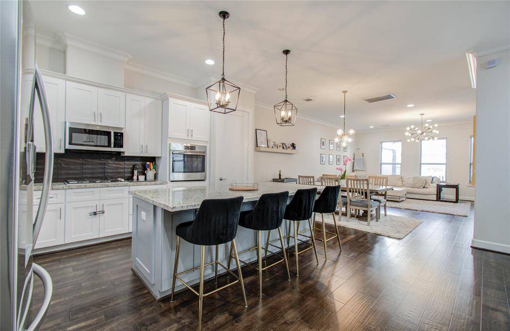 View of the beautiful open concept Kitchen, Dining & Living area