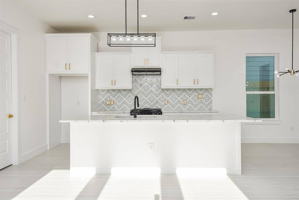 Stunning New Build in Houston's Northside! This beautifully designed 2-story home features 3 spacious bedrooms, 2 baths, a versatile game room, and the added convenience of a primary bedroom on the first floor. Nestled just minutes away from top-tier dining, shopping, parks, and scenic walking trails, this home offers the perfect balance of convenience and lifestyle. Plus, with quick access to I-69 and the Inner Loop, commuting is a breeze!