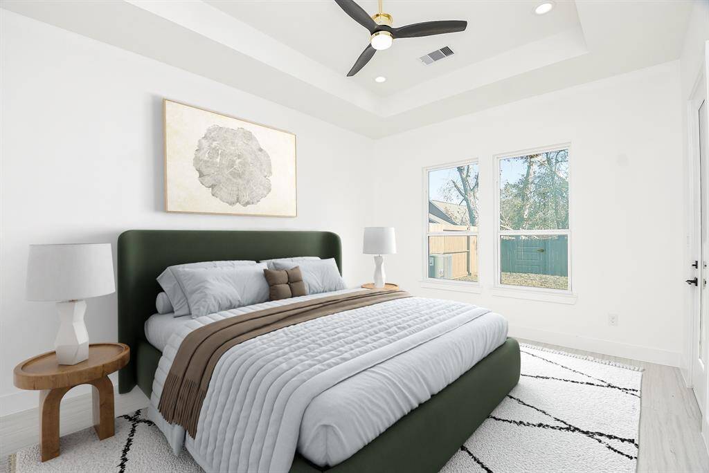 Spacious walk-in primary closet featuring built-in shelving and ample hanging space. Designed for optimal organization, this closet offers both style and functionality.