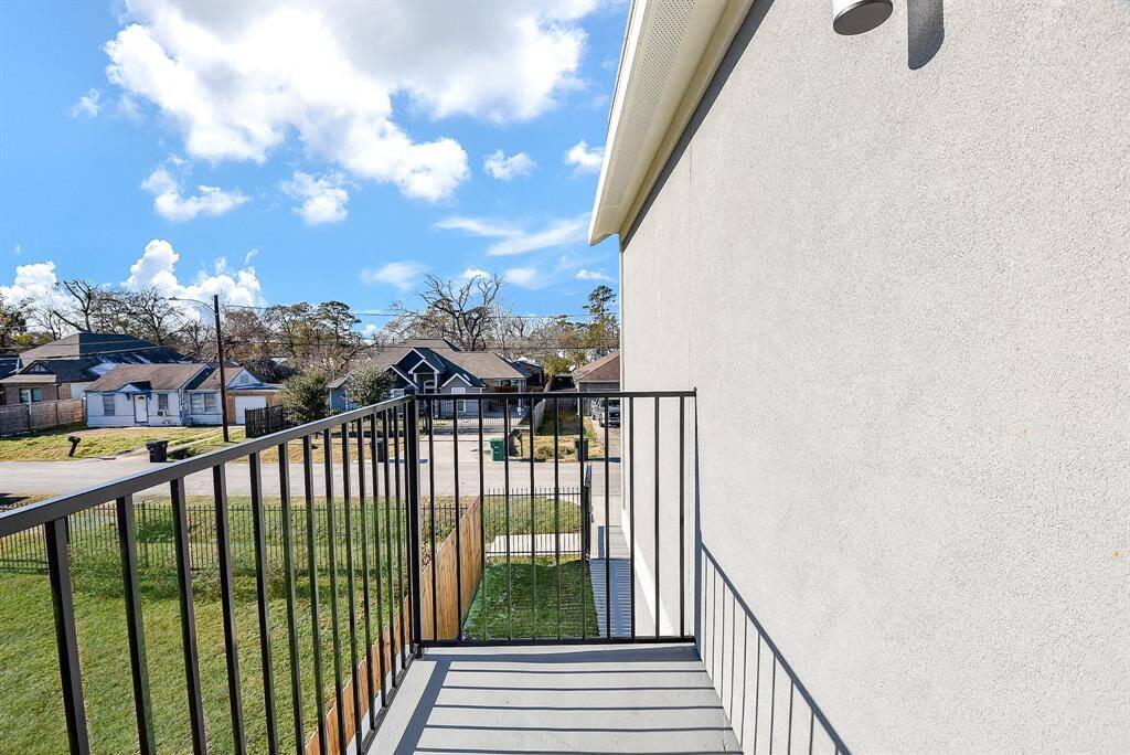 The upstairs secondary bedrooms offer comfort and style, featuring plush carpeting, modern ceiling fans, and recessed lighting. Bright and airy, these rooms provide a cozy retreat for family or guests.