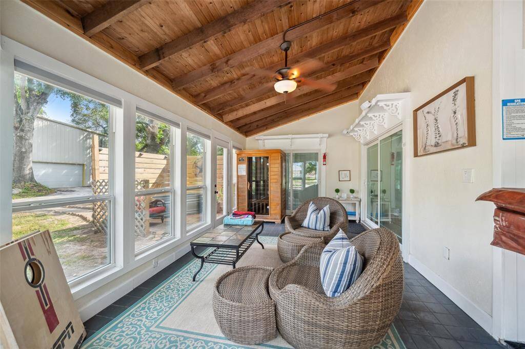 Enjoy relaxing in the sunroom.