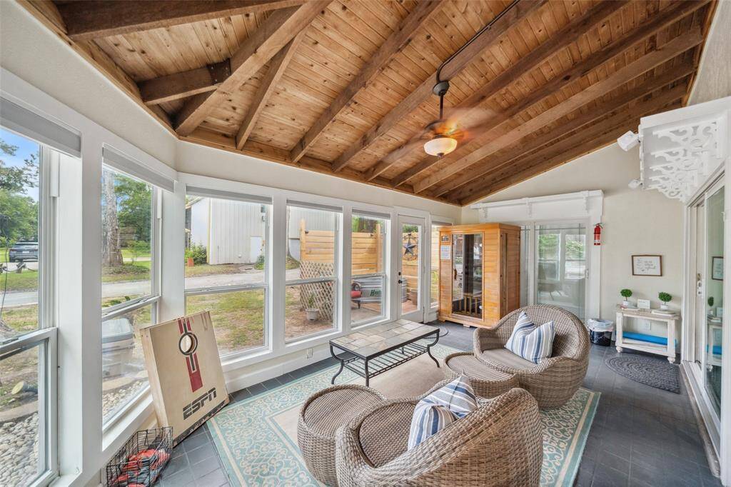 It is a wall of windows on the back side of the home allowing for a relaxing morning with coffee or an evening in the hot tub.