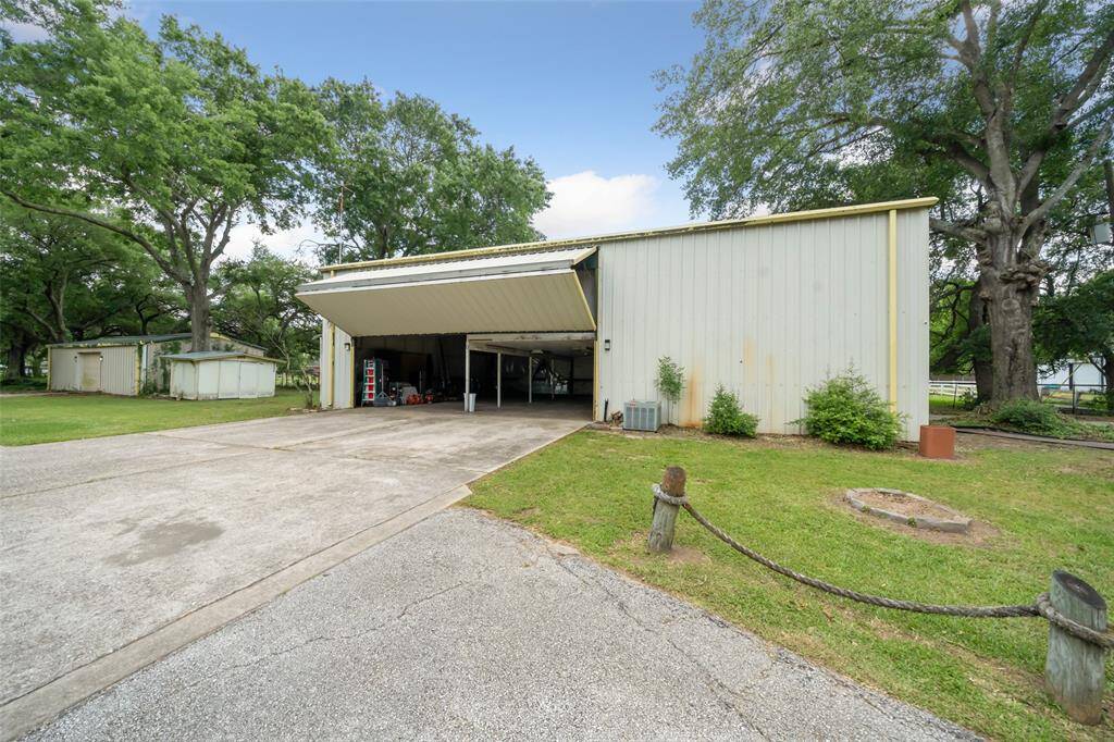 Front view of the hanger. Full living quarters upstairs.