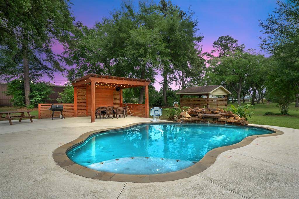 Beautiful view of the pool at dusk.