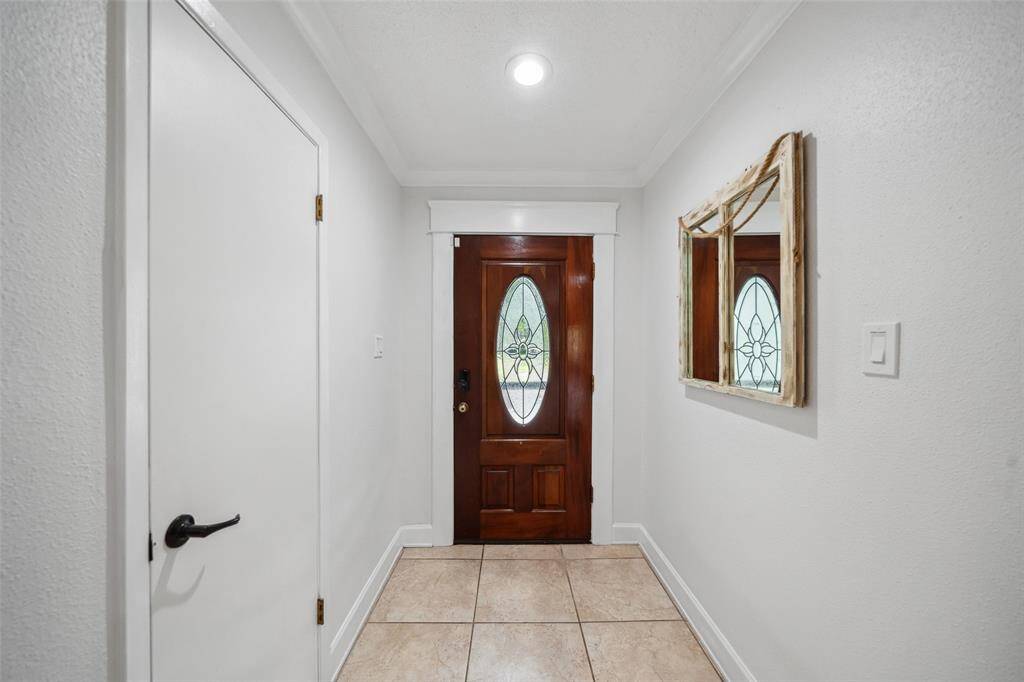 Front entrance with coat closet.