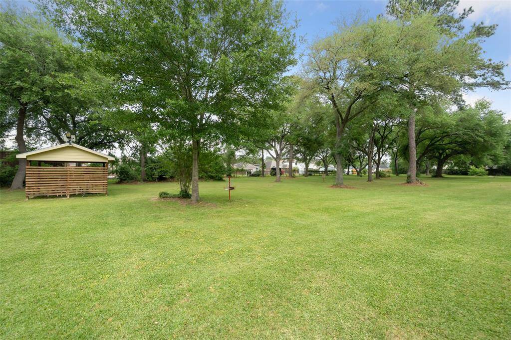 The side yard has a lot open space to enjoy, use as a business or subdivide.