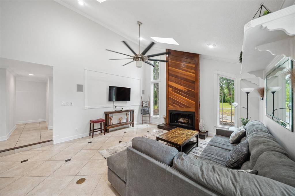 Another view of the family/living space equipped with natural light from the skylights.