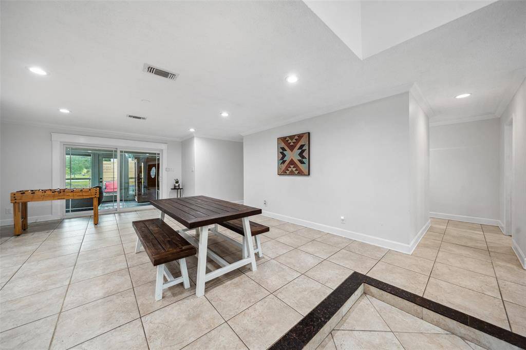 Dining area is big enough for your largest dining table and additional furniture.