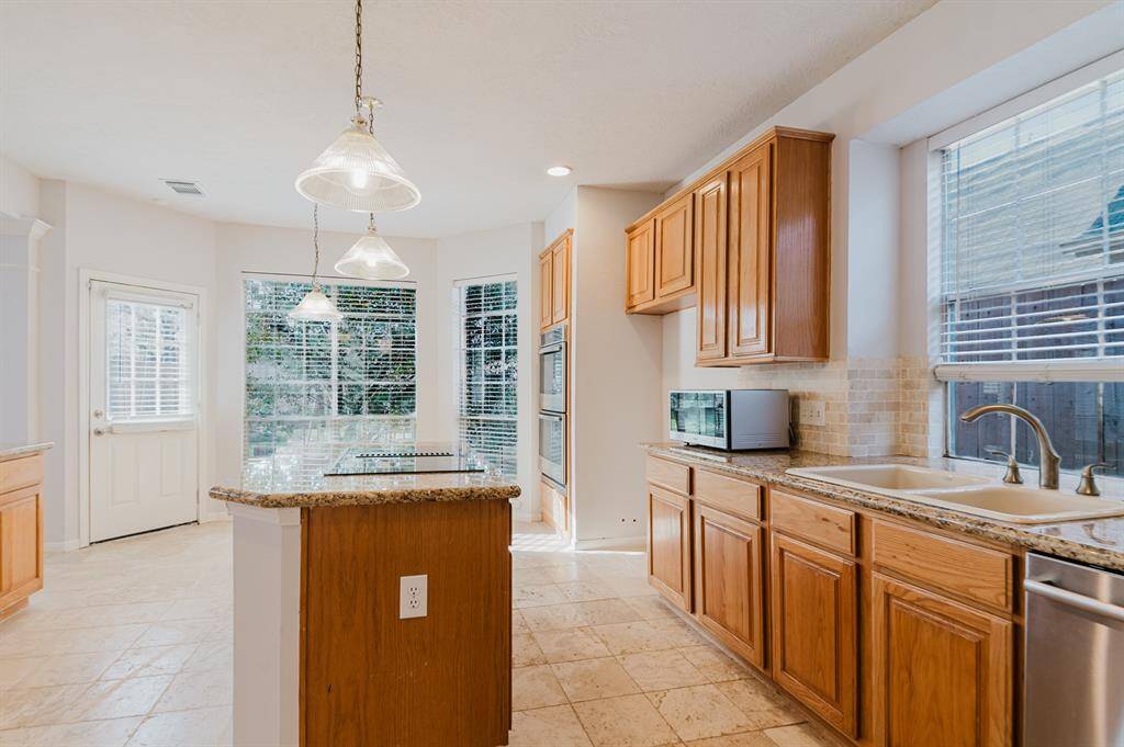 Charming bay window in the kitchen, allowing natural light to fill the space.