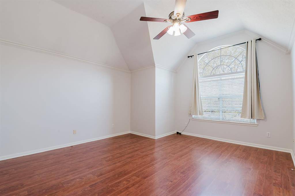 Inviting primary bedroom, a peaceful retreat with plenty of natural light.