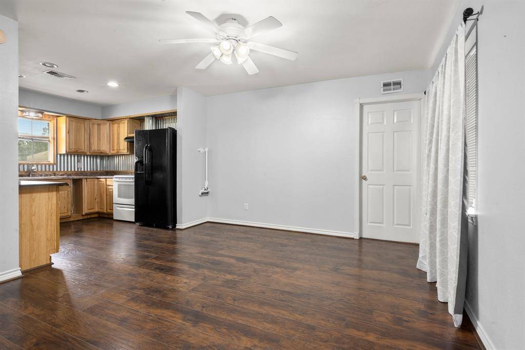 Another view of the family room and kitchen areas