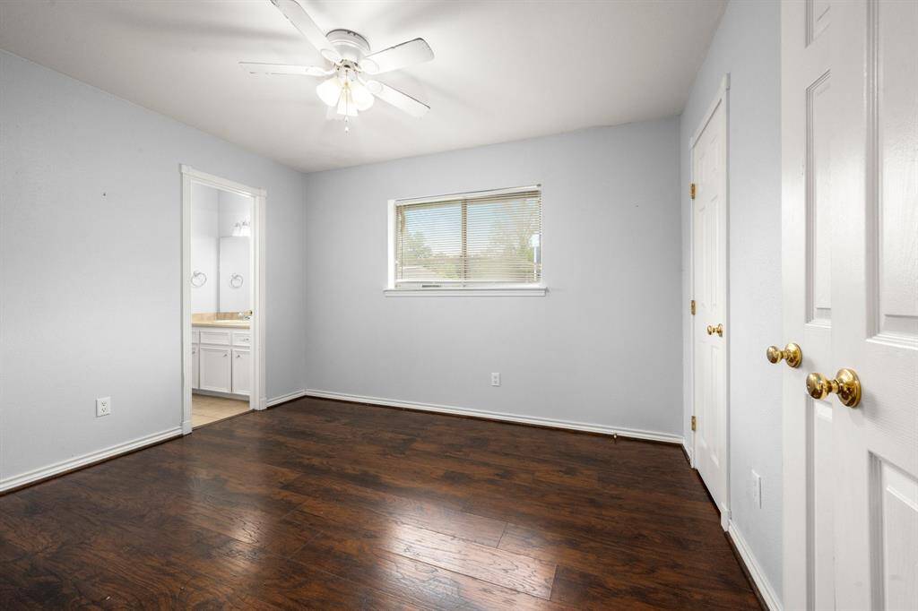 Primary bedroom with half bath attached.