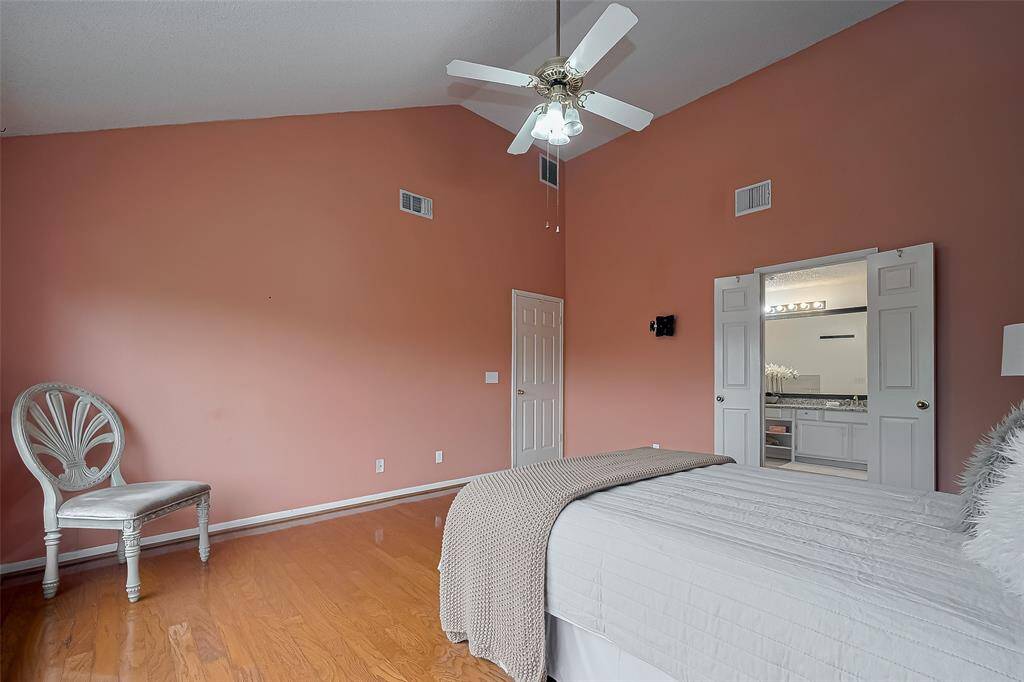 The primary bedroom boasts an ensuite bath