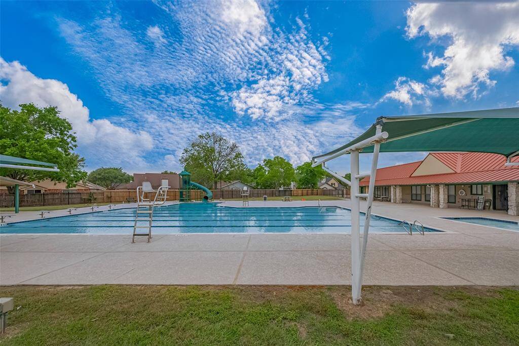 The neighborhood pool with slide and rec center