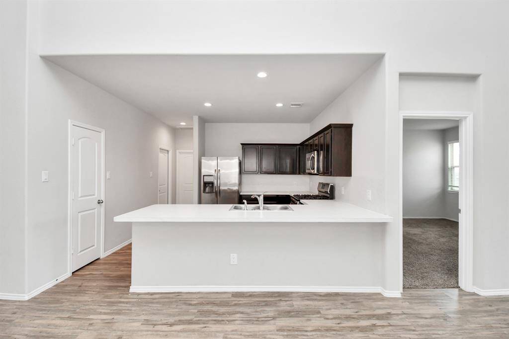 Photos displayed may be of similar unites or floor plans featuring the same finishes.