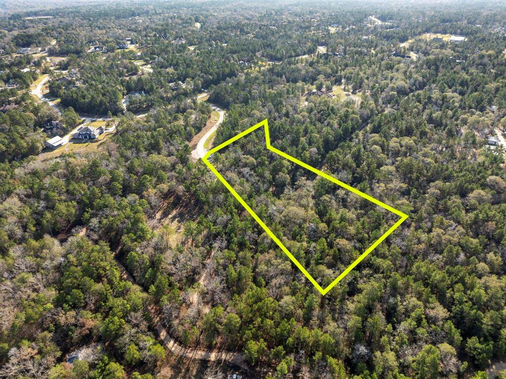 Located in the prestigious acreage community of High Meadow Estates.