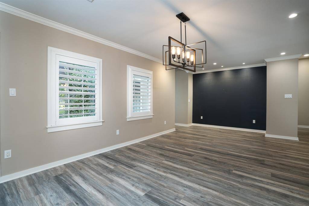 Large dining space with wall space for a china cabinet or bar area.